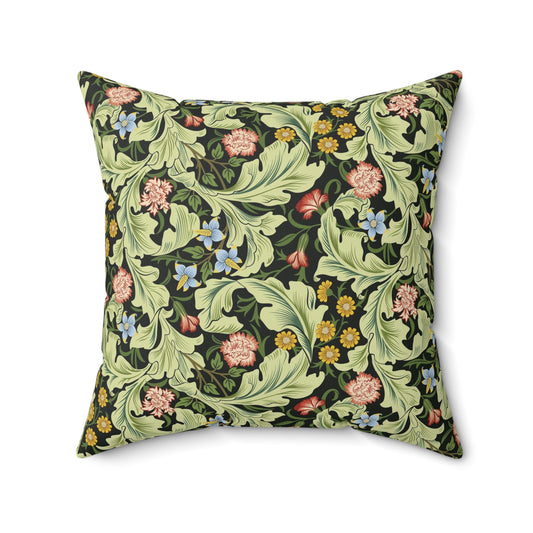 A square-shaped cushion with a green faux suede cover featuring a floral pattern designed by William Morris - Leicester Collection.
