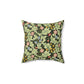 A square-shaped cushion with a green faux suede cover featuring a floral pattern designed by William Morris - Leicester Collection.