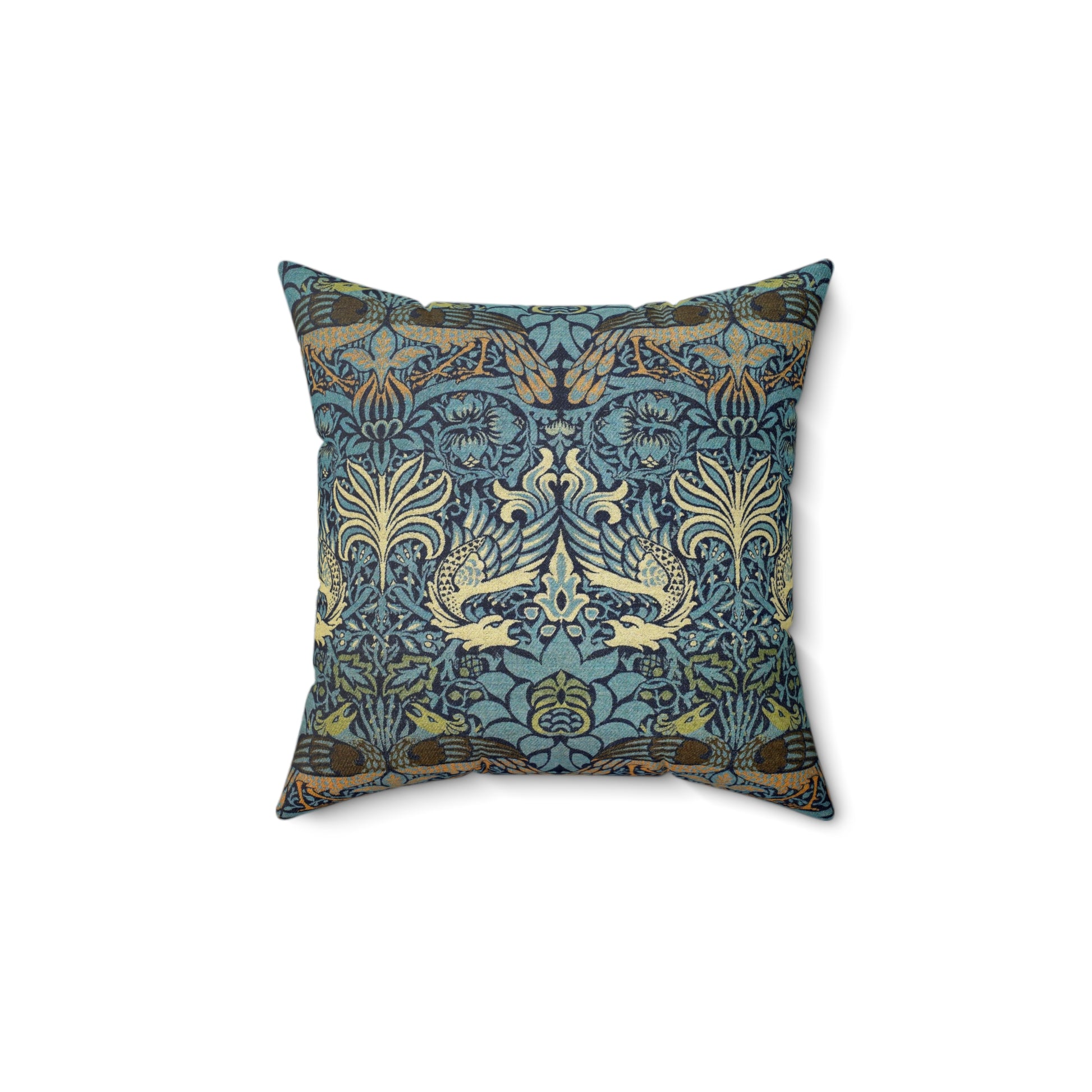 A square-shaped throw pillow with a  William Morris & Co floral and peacock design on a dark blue background with a visible concealed zipper.