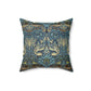 A square-shaped throw pillow with a  William Morris & Co floral and peacock design on a dark blue background with a visible concealed zipper.