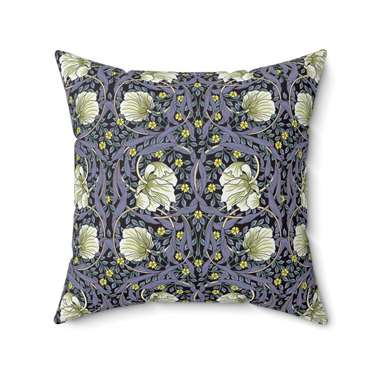 A square-shaped faux suede cushion with an floral William Morris & Co pattern called Pimpernel in shades of purple, green and yellow.