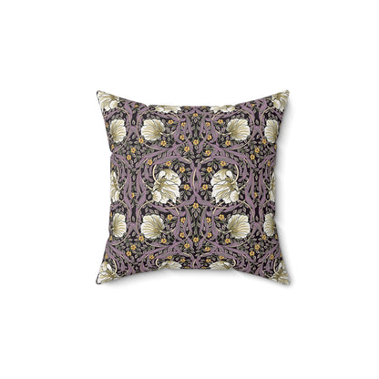 A square-shaped cushion with a floral William Morris & Co pattern in a rosewood colour palette, featuring a concealed zipper.