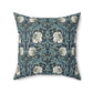 A square-shaped cushion with a floral William Morris & Co pattern called Pimpernel in shades of blue, yellow, beige and white.