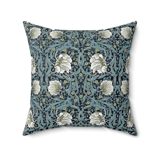 A square-shaped cushion with a floral William Morris & Co pattern called Pimpernel in shades of blue, yellow, beige and white.