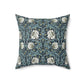 A square-shaped cushion with a floral William Morris & Co pattern called Pimpernel in shades of blue, yellow, beige and white.