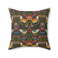 Decorative pillow with a floral and bird pattern on a dark background