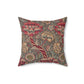 A square-shaped cushion with a floral William Morris & Co pattern called Wandle in red, beige, and darker shades of red on a darker background.