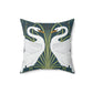 A square-shaped throw pillow with a William Morris & Co design of white swans on a green and blue patterned background.