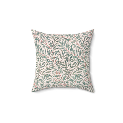 Decorative pillow with leaf pattern on a white background