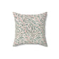Decorative pillow with leaf pattern on a white background
