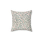 Decorative pillow with leaf pattern on a white background