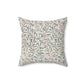 Decorative pillow with leaf pattern on a white background