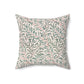 Decorative pillow with leaf pattern on a white background
