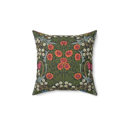 A square-shaped faux suede cushion with a floral pattern inspired by William Morris, featuring a green background with red and white flowers.