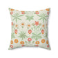 A square faux suede cushion with a floral pattern in shades of green, orange, and pink.
