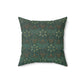 A square-shaped faux suede cushion with a geometric green pattern inspired by William Morris - Ispahan Collection.