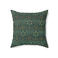 A square-shaped faux suede cushion with a geometric green pattern inspired by William Morris - Ispahan Collection.