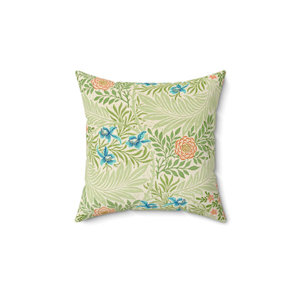 A square-shaped faux suede cushion with an all-over print featuring a William Morris & Co floral pattern in shades of green, blue, and orange.