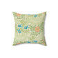A square-shaped faux suede cushion with an all-over print featuring a William Morris & Co floral pattern in shades of green, blue, and orange.