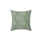 A square-shaped faux suede cushion with a floral pattern in a green colour, inspired by William Morris - Marigold Collection.