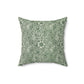 A square-shaped faux suede cushion with a floral pattern in a green colour, inspired by William Morris - Marigold Collection.