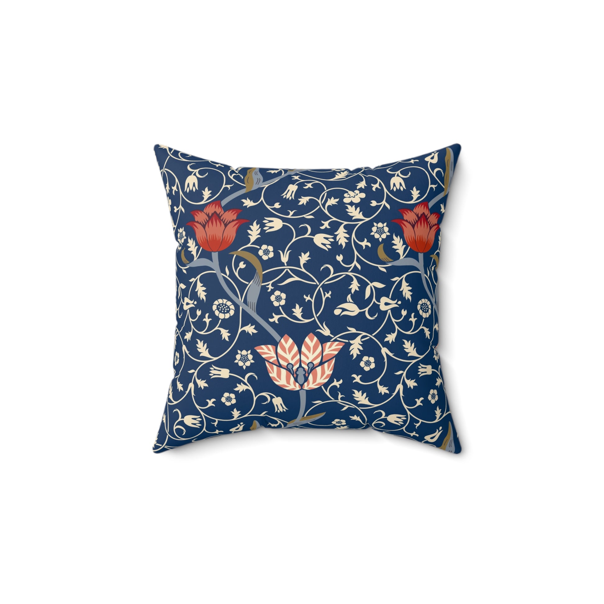 A square-shaped faux suede cushion with a floral pattern inspired by William Morris, predominantly in blue with red and white accents.