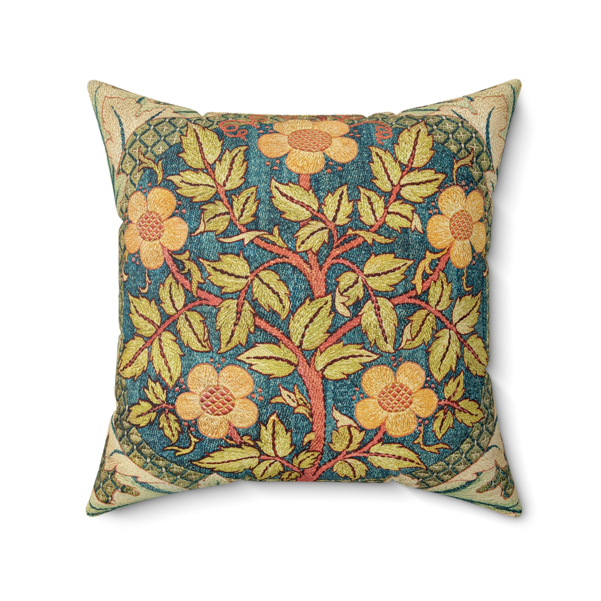 A square faux suede cushion with a William Morris & Co floral design in green, yellow and red.