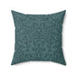 A square-shaped throw pillow with a teal colour, featuring a floral pattern of acorns and oak leaves inspired by William Morris.