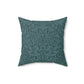 A square-shaped throw pillow with a teal colour, featuring a floral pattern of acorns and oak leaves inspired by William Morris.