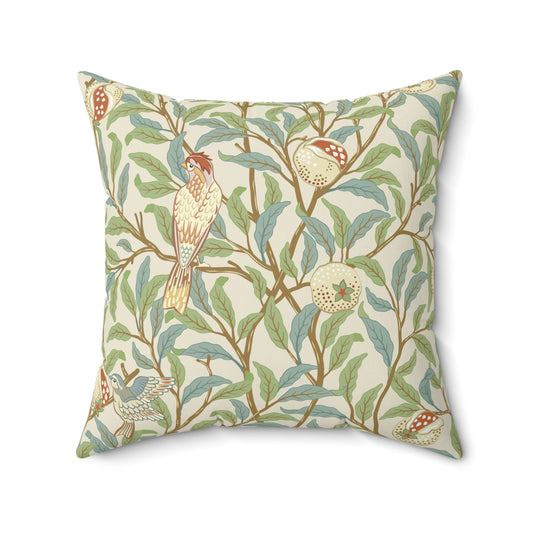 A square-shaped cushion with an all-over William Morris & C0 print featuring birds and pomegranate fruits on a beige background.