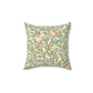 A square-shaped cushion with an all-over William Morris & Co print featuring birds and pomegranate fruits on a beige background.