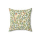 A square-shaped cushion with an all-over William Morris & Co print featuring birds and pomegranate fruits on a beige background.