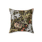 A square-shaped faux suede cushion with a William Morris & Co floral pattern design, predominantly in shades of green, brown and white.