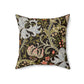 A square-shaped faux suede cushion with a William Morris & Co floral pattern design, predominantly in shades of green, brown and white.