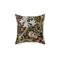 A square-shaped faux suede cushion with a William Morris & Co floral pattern design, predominantly in shades of green, brown and white.