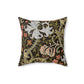 A square-shaped faux suede cushion with a William Morris & Co floral pattern design, predominantly in shades of green, brown and white.