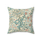 A square-shaped cushion with a floral William Morris & Co pattern featuring lilies, predominantly in shades of mineral and white.