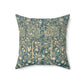 A square faux suede cushion with a floral pattern in evergreen teal colors.