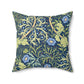 A square faux suede cushion with a blue floral pattern based on the Seaweed Collection design by William Morris & Co.