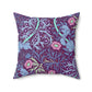 A square faux suede cushion with a floral William Morris & Co pattern in pink, green, and purple colours called Seaweed.