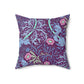 A square faux suede cushion with a floral William Morris & Co pattern in pink, green, and purple colours called Seaweed.