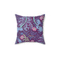 A square faux suede cushion with a floral William Morris & Co pattern in pink, green, and purple colours called Seaweed.