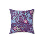 A square faux suede cushion with a floral William Morris & Co pattern in pink, green, and purple colours called Seaweed.