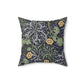 A square faux suede cushion with a yellow flower and seaweed William Morris & Co pattern, predominantly dark in colour.