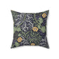 A square faux suede cushion with a yellow flower and seaweed William Morris & Co pattern, predominantly dark in colour.
