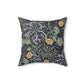 A square faux suede cushion with a yellow flower and seaweed William Morris & Co pattern, predominantly dark in colour.