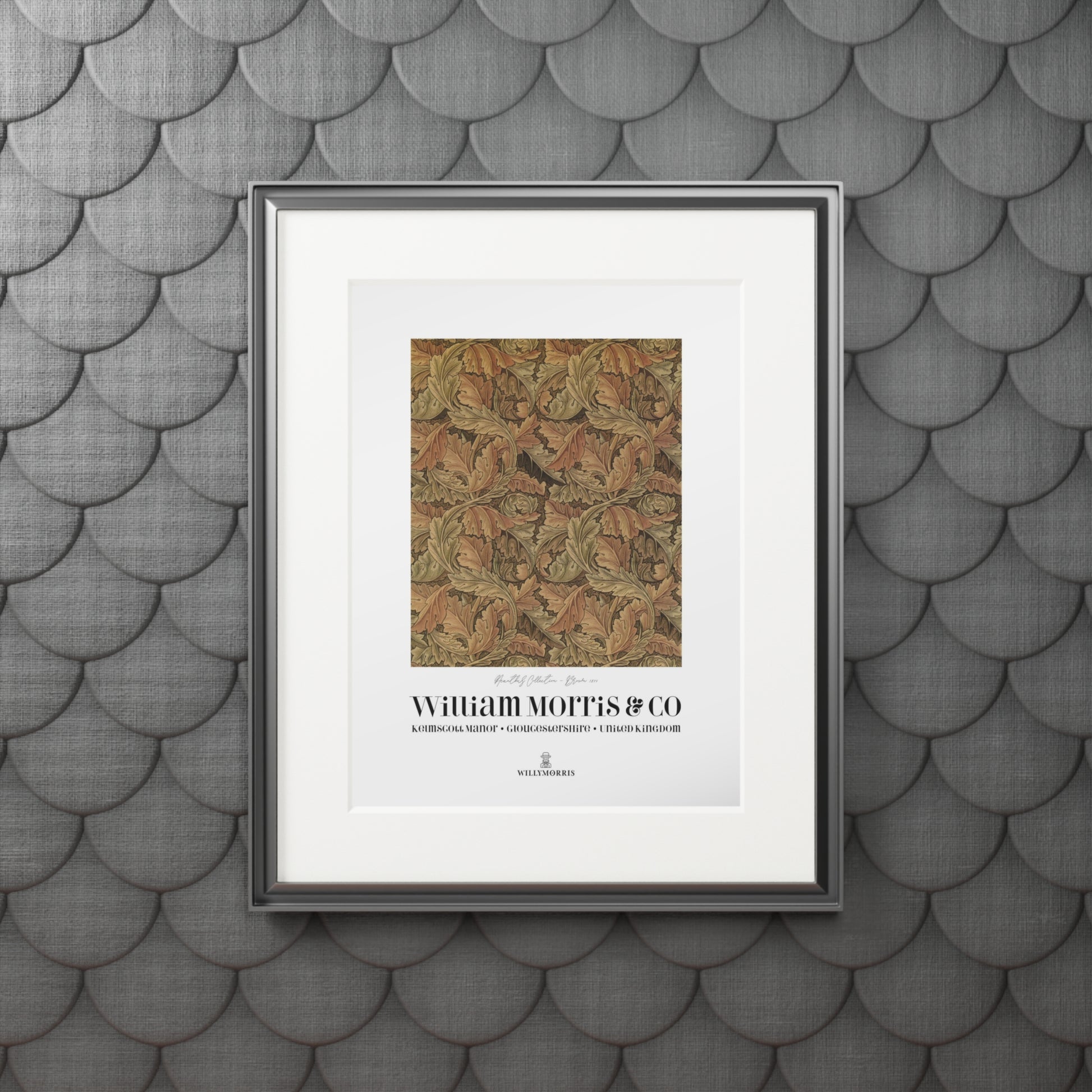 Framed artwork with 'William Morris & Co' design on a textured gray wall.