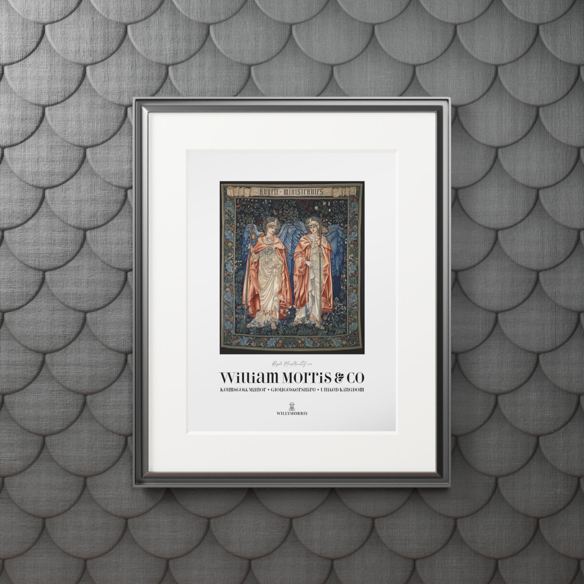 Framed artwork with two figures on a textured gray wall