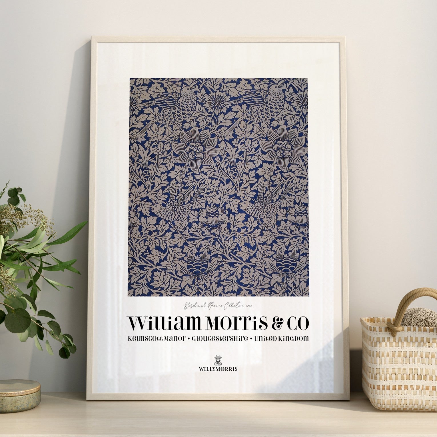 Framed poster with floral pattern and 'William Morris & Co' branding on a light background.