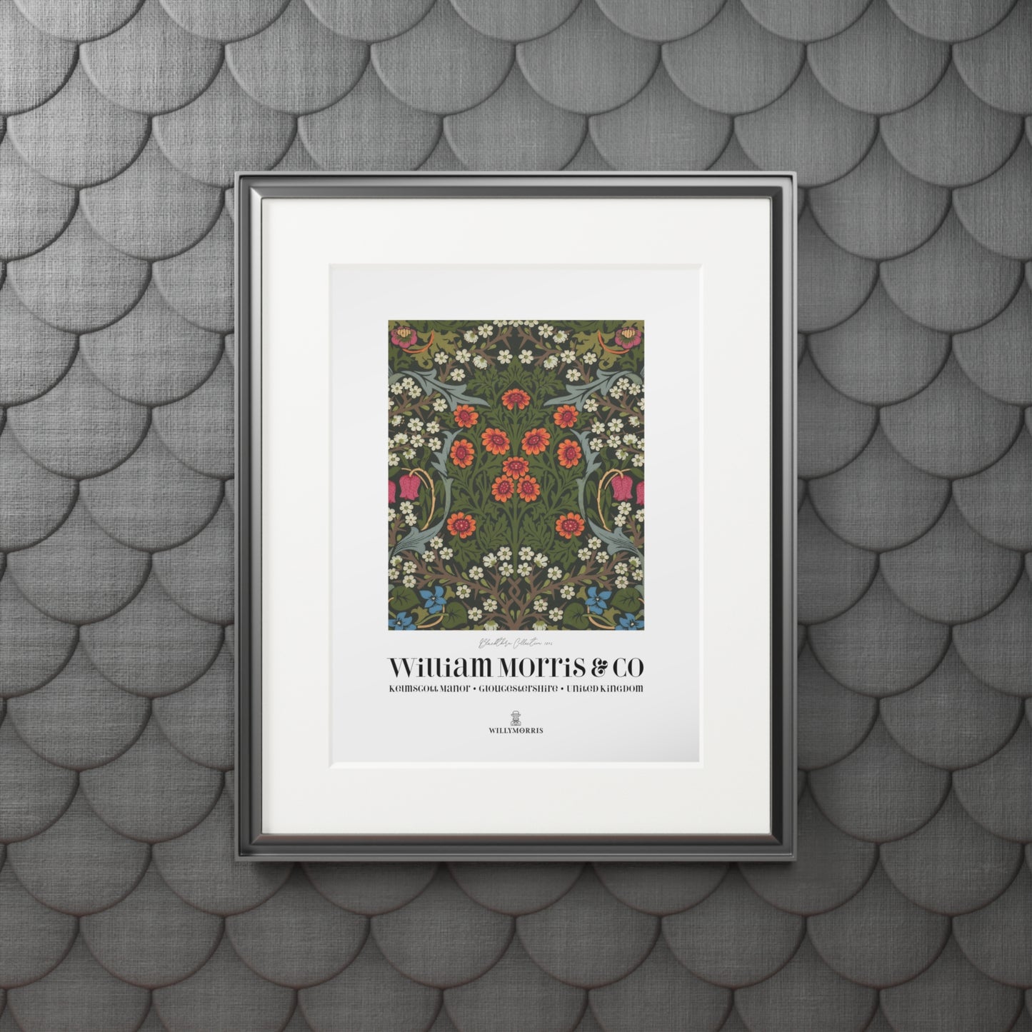Framed artwork with floral pattern and text on a textured gray wall